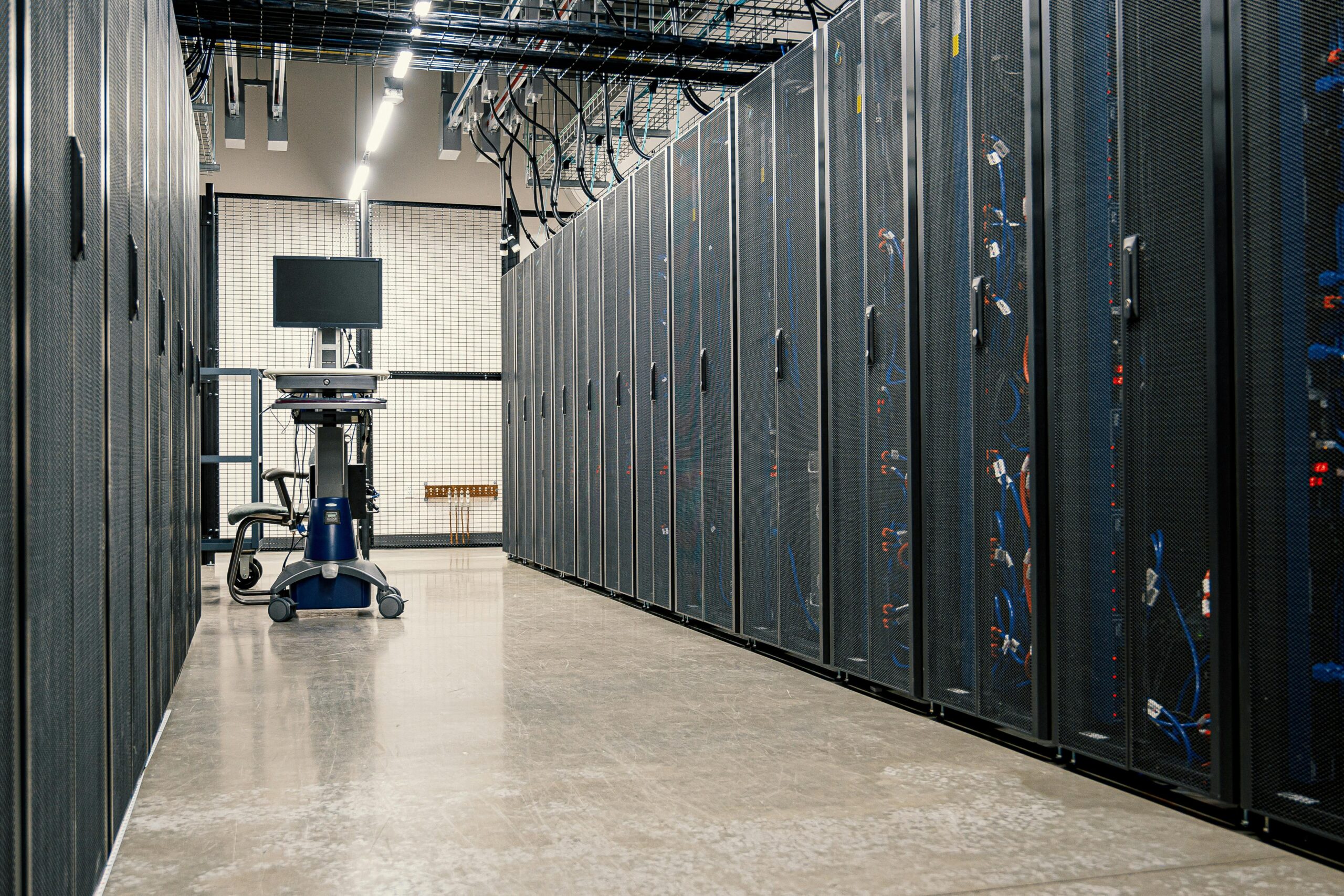 Technician installing network cabling